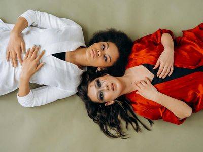 A person transitioning smoothly between two exercise poses.