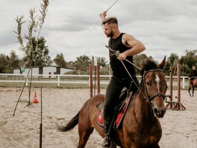 Man performing a slow, controlled lunge exercise.